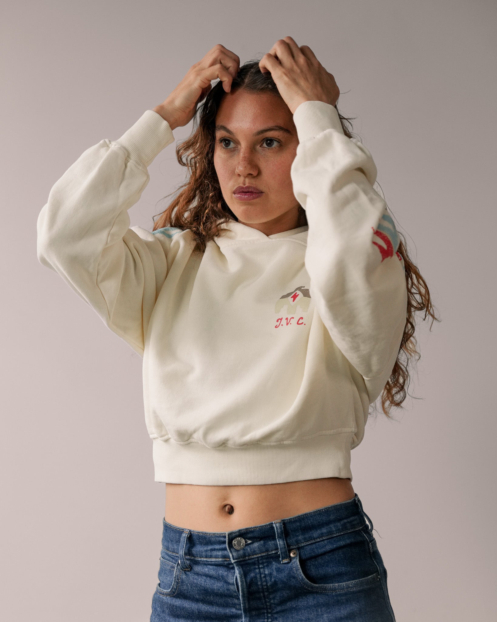 Two Arrows Cream Cropped Hoodie