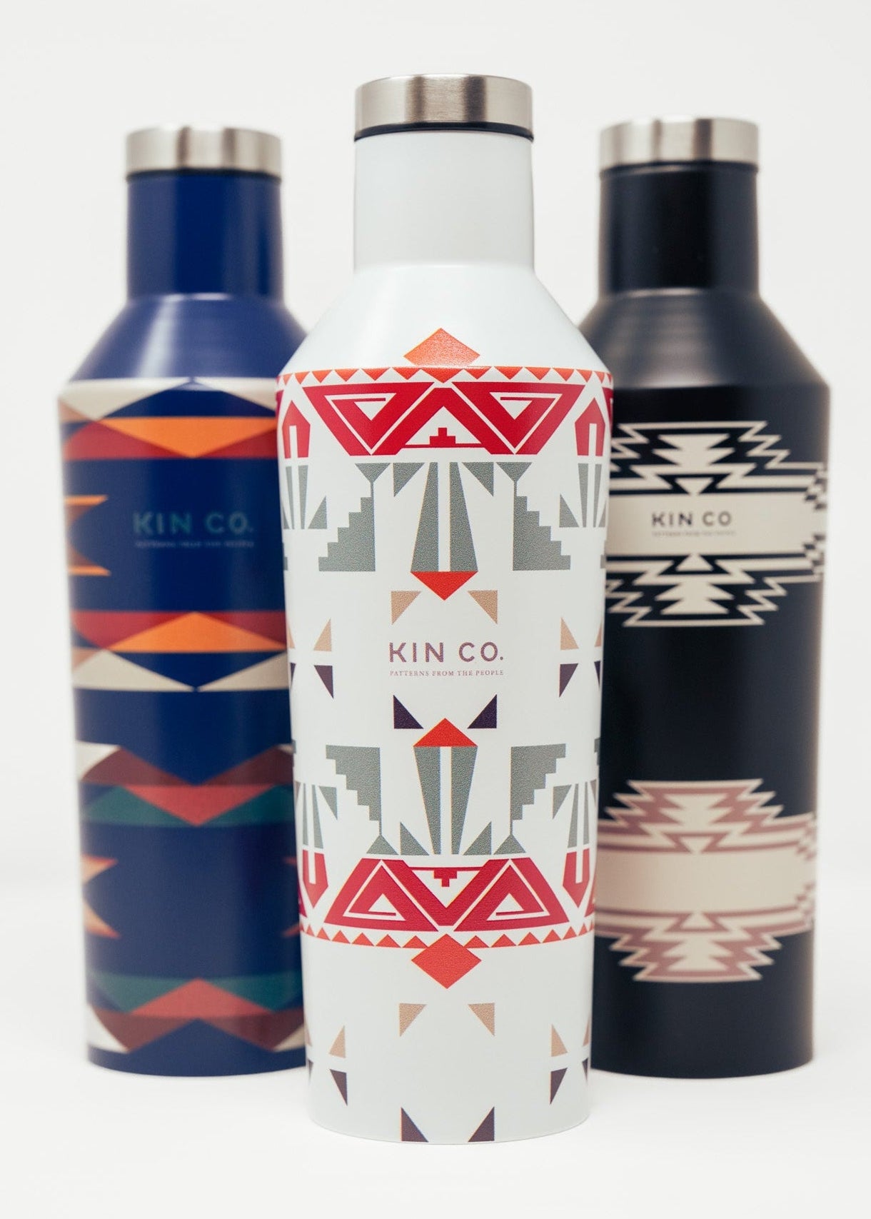 Three stainless steel water containers with geometric patterns, featuring a variety of colors.
